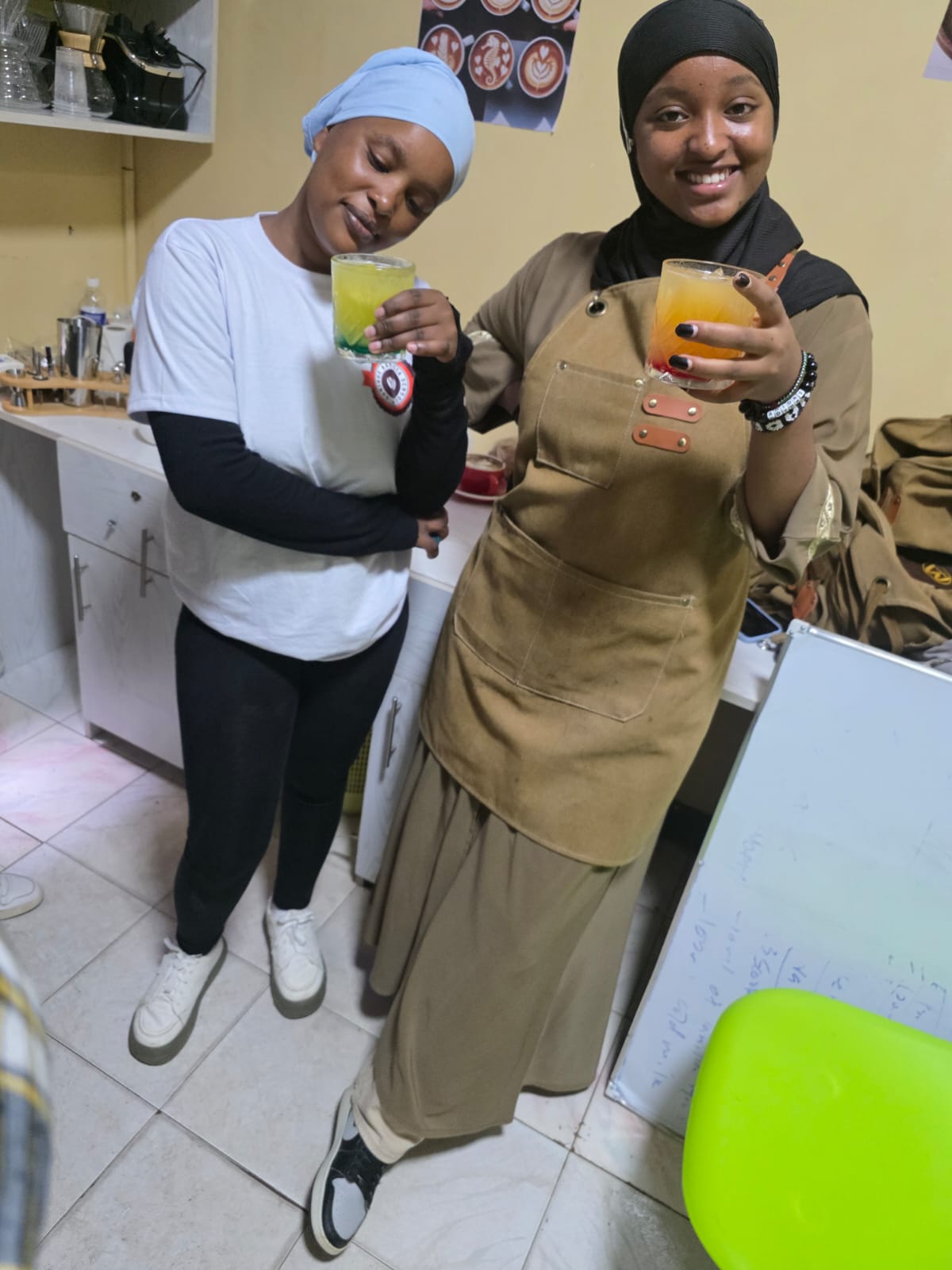 students holding drinks